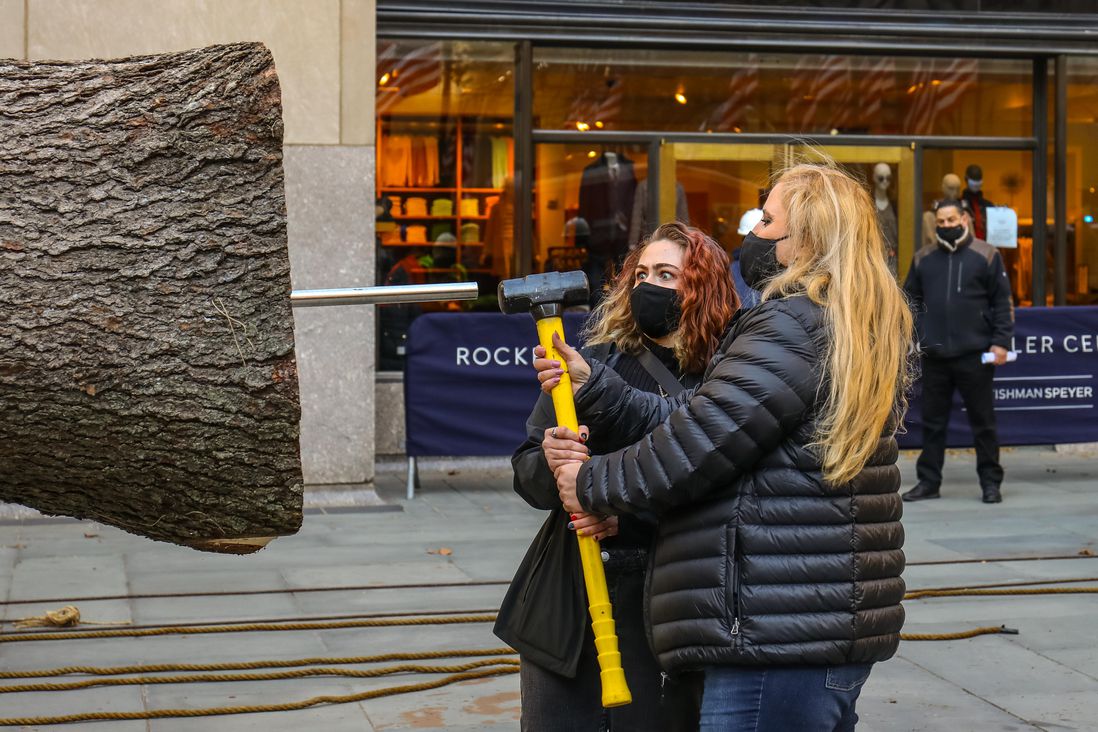 The newly arrived tree in Rockefeller Center, getting spiked